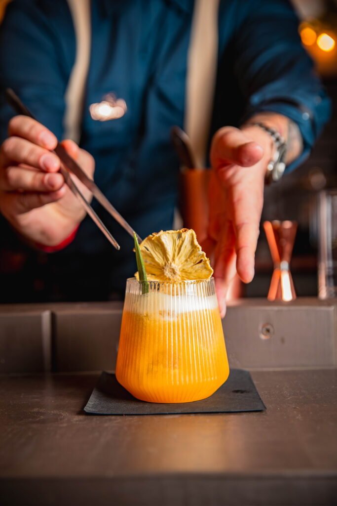signature cocktail being prepared